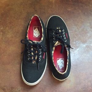 Black Vans with cheetah detail